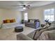 Living room with comfortable seating, a ceiling fan, and natural light at 1326 Nantahala Ne Trl, Marietta, GA 30062