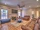 Bright living room with fireplace, hardwood flooring, and a cozy seating area at 1326 Nantahala Ne Trl, Marietta, GA 30062