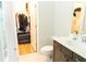 Bathroom featuring modern vanity and walk-in closet at 2141 Hempstead Ct, Snellville, GA 30078