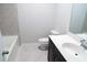 Bathroom featuring tub, modern vanity, and tile floors at 2141 Hempstead Ct, Snellville, GA 30078