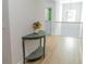 Hallway with a console table and hardwood floors at 2141 Hempstead Ct, Snellville, GA 30078