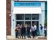 Street view of 'Big Softie' storefront with crowd outside at 26 Ormond, Atlanta, GA 30315