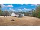 Spacious back yard with fire pit and room for outdoor activities at 266 Carthage Blvd, Rockmart, GA 30153