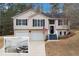 Charming 2-story home with a well-maintained yard, attached garage and inviting front entrance at 266 Carthage Blvd, Rockmart, GA 30153