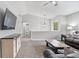 Cozy living room features neutral paint, vaulted ceilings, and a stylish chandelier at 266 Carthage Blvd, Rockmart, GA 30153