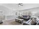 Cozy living room features neutral paint, vaulted ceilings, and a stylish chandelier at 266 Carthage Blvd, Rockmart, GA 30153