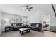 Cozy living room features neutral paint, vaulted ceilings, and a stylish chandelier at 266 Carthage Blvd, Rockmart, GA 30153