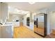 Bright kitchen with stainless steel appliances and hardwood flooring at 795 Saddle Ridge Trce, Roswell, GA 30076