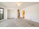 Spacious main bedroom with neutral carpet, closet, and bright natural light at 795 Saddle Ridge Trce, Roswell, GA 30076