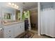 Modern bathroom featuring walk-in tile shower, vanity with solid countertop, and attractive décor at 106 Lanyard Bnd, Peachtree City, GA 30269