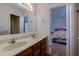 Bathroom featuring dual sinks, countertop and a separate area with a bath tub and shower at 106 Lanyard Bnd, Peachtree City, GA 30269