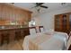 Open-concept dining room featuring laminate floors and direct access to kitchen counters at 106 Lanyard Bnd, Peachtree City, GA 30269