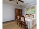 Cozy dining room with a table set for a meal and a cabinet for storage at 106 Lanyard Bnd, Peachtree City, GA 30269