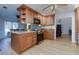 Modern kitchen with stainless steel appliances, breakfast bar and ample storage space at 106 Lanyard Bnd, Peachtree City, GA 30269