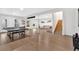 Finished basement with wood floors, ping pong table, cozy lounge, and stairs at 108 Rex Ave, Canton, GA 30114