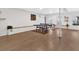 Finished basement with wood floors, built-in shelving, and a ping pong table at 108 Rex Ave, Canton, GA 30114
