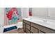 Bright bathroom with double sink vanity, modern finishes, and fun mermaid shower curtain at 108 Rex Ave, Canton, GA 30114