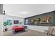Spacious bedroom with multiple windows, accent wall, and trendy decor at 108 Rex Ave, Canton, GA 30114