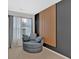 Cozy bedroom nook with decorative wall, gray walls, comfortable chair and natural light at 108 Rex Ave, Canton, GA 30114