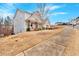 Charming two-story home with neutral siding and a brick facade, featuring a covered front porch and sidewalk access at 108 Rex Ave, Canton, GA 30114