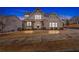 Charming two-story home with a combination of siding and brick exterior, complemented by a well-maintained lawn at 108 Rex Ave, Canton, GA 30114