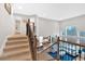 High angle view of the foyer, showing stairway, kitchen, and great room at 108 Rex Ave, Canton, GA 30114