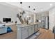 Beautiful kitchen features a large island, stainless steel appliances, and open floor plan at 108 Rex Ave, Canton, GA 30114
