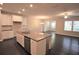 Spacious kitchen featuring a granite island and stainless steel appliances at 680 Mason Grove Pkwy, Lawrenceville, GA 30043