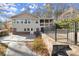 Backyard view featuring a patio, a fence, and the house, providing outdoor living and security at 541 Hickory Sw Dr, Marietta, GA 30064