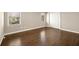 This is a bedroom with hardwood floors and windows at 541 Hickory Sw Dr, Marietta, GA 30064