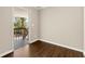 A bedroom with hardwood floors and glass doors to a deck at 541 Hickory Sw Dr, Marietta, GA 30064