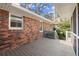 Exterior view of a deck with brick siding and neutral paint trim at 541 Hickory Sw Dr, Marietta, GA 30064