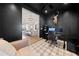 Home office with dark walls, plaid carpet and view of living room at 847 Cumberland Ave, Dallas, GA 30157