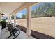 Charming front porch featuring rocking chairs and views of the home's large front yard at 847 Cumberland Ave, Dallas, GA 30157