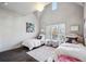 Charming bedroom with high ceilings, bright windows, hardwood floors, and two twin beds at 1377 Village Park Ne Dr, Brookhaven, GA 30319