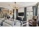 Spacious living room with fireplace, hardwood floors, and French doors to patio at 1377 Village Park Ne Dr, Brookhaven, GA 30319