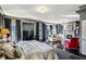 Spacious main bedroom with fireplace, sitting area, and large windows at 1377 Village Park Ne Dr, Brookhaven, GA 30319