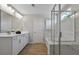 Contemporary bathroom with a double vanity, separate shower and tub, and modern fixtures at 280 Rockledge Sw Bnd, Powder Springs, GA 30127