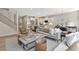 Spacious living area with a modern kitchen, dining area, and comfortable seating at 280 Rockledge Sw Bnd, Powder Springs, GA 30127