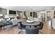 Open concept living space with a fireplace, modern furnishings, and great natural light at 280 Rockledge Sw Bnd, Powder Springs, GA 30127