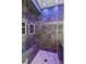 Shower featuring a shower bench, wall accents and modern finishes at 4865 Meadow Park Ln, Suwanee, GA 30024
