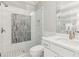 Elegant bathroom with glass-enclosed shower and modern fixtures at 4865 Meadow Park Ln, Suwanee, GA 30024
