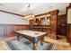 Game room with a pool table and wet bar, perfect for entertaining at 4865 Meadow Park Ln, Suwanee, GA 30024