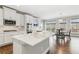 A newly remodeled kitchen with stainless steel appliances, custom cabinets, and a breakfast nook at 4865 Meadow Park Ln, Suwanee, GA 30024