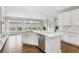A bright and airy kitchen with large windows and stainless steel appliances at 4865 Meadow Park Ln, Suwanee, GA 30024