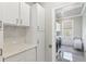Well-equipped laundry room with ample storage and modern appliances for convenience at 4865 Meadow Park Ln, Suwanee, GA 30024