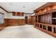 Spacious living room featuring custom wood built-ins and detailed trim work at 4865 Meadow Park Ln, Suwanee, GA 30024