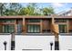 Modern townhome features a private deck, sleek black-framed windows, and a neutral color palette at 622 Bellemeade Nw Ave # 2, Atlanta, GA 30318