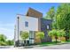 A modern townhome with clean lines, mixed materials, and professional landscaping at 622 Bellemeade Nw Ave # 2, Atlanta, GA 30318