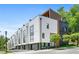 Modern townhome with two-car garages and a mix of brick and siding exteriors at 622 Bellemeade Nw Ave # 2, Atlanta, GA 30318